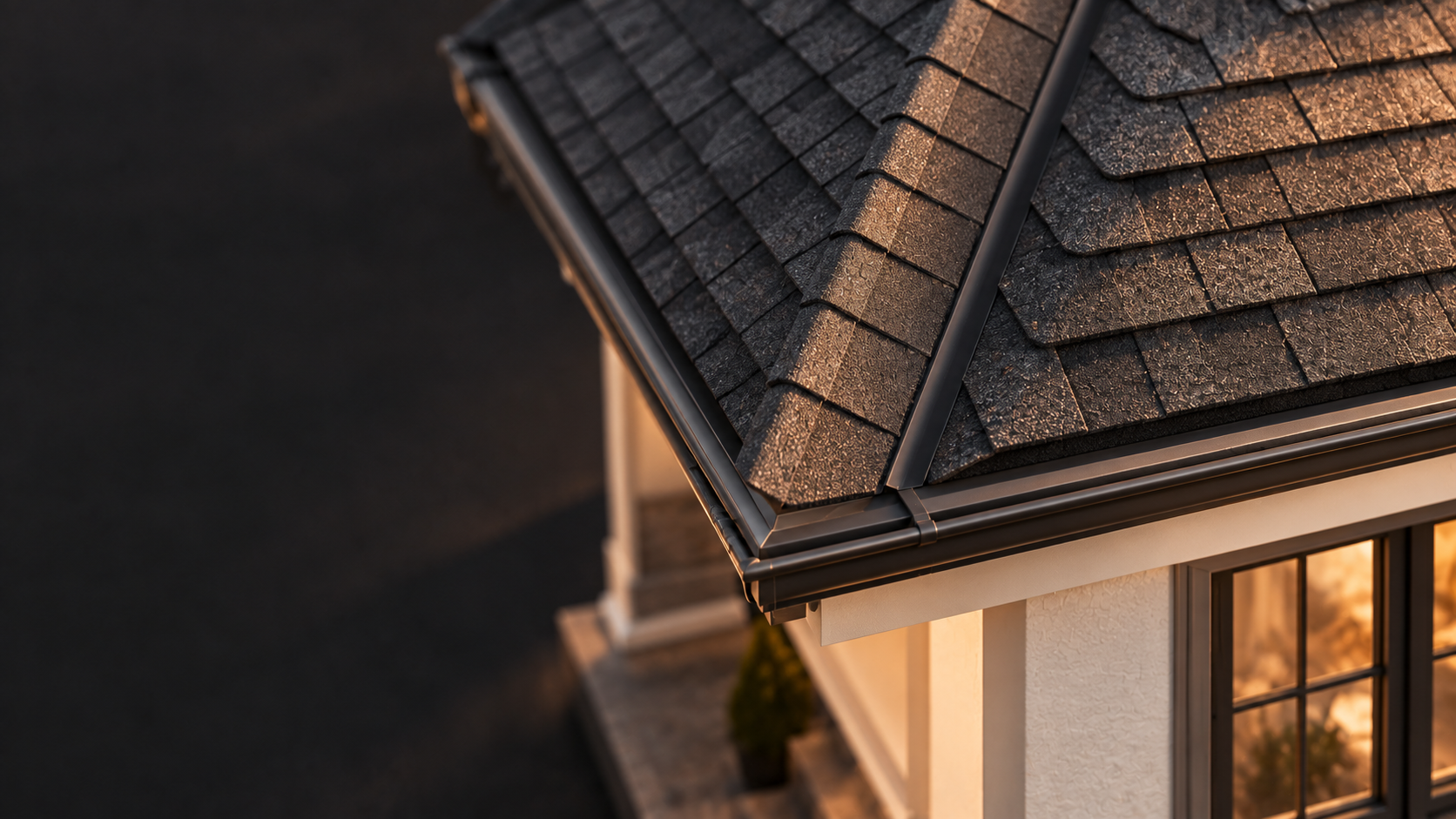 Shingles meeting valley flashing and the roof edge