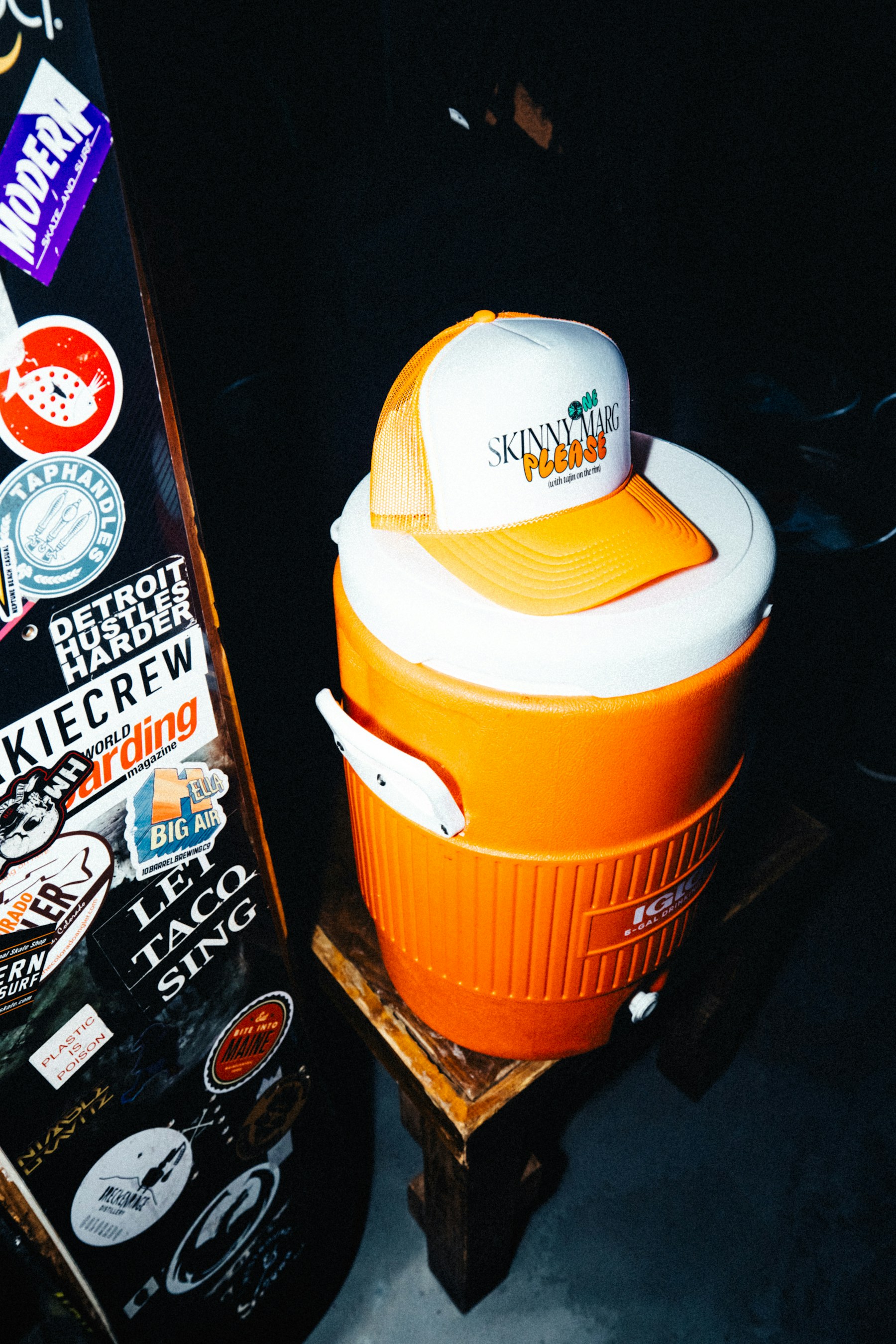 Sticker-covered skateboard deck